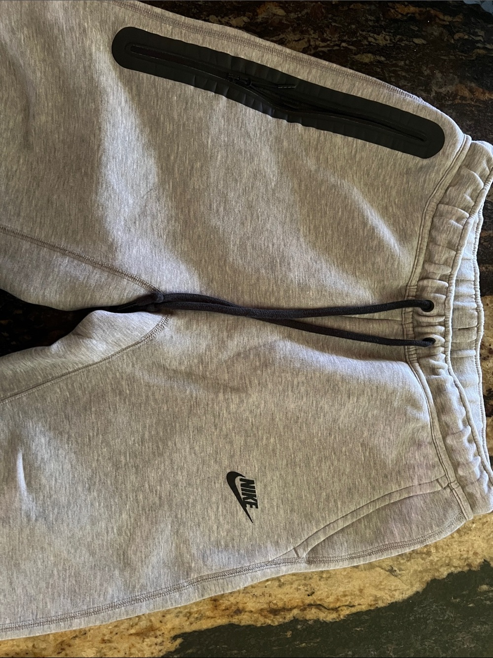 Nike Gray  Fleece Joggers with Black Zip Accents